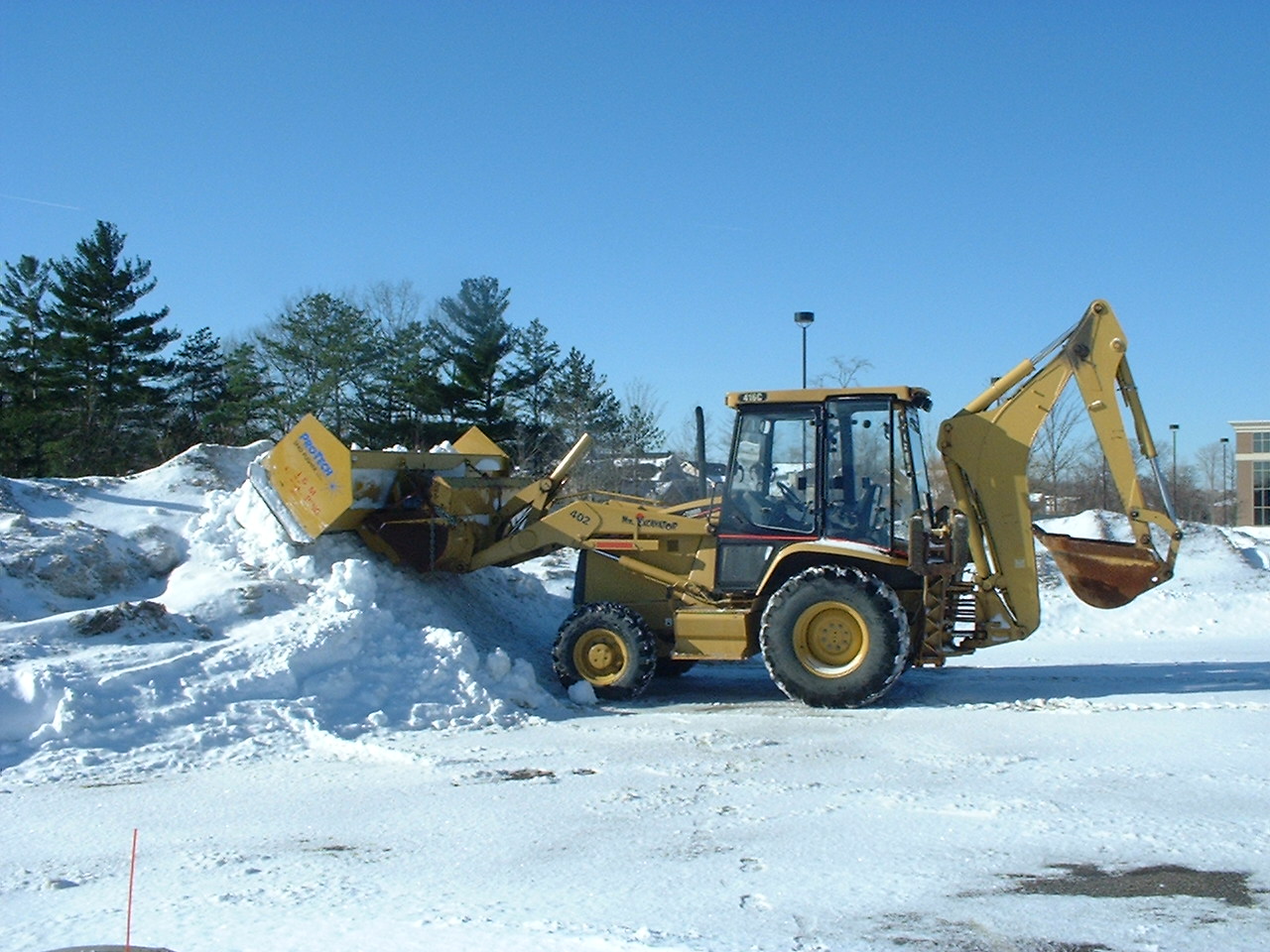 Backhoe Used for Plowing Snow in Cleveland
